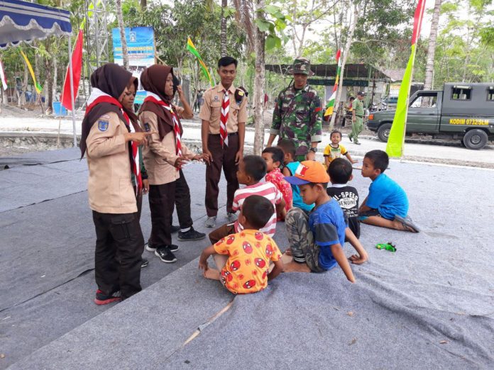 TNI Dan Pramuka  Bacakan Dongeng Untuk Anak  Anak  Balecatur 