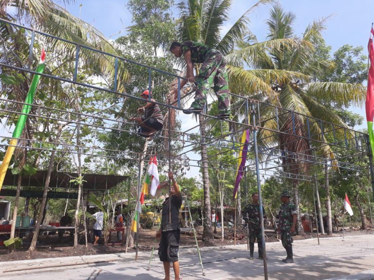 Antisipasi Hujan, Tenda Di Pasang Dilokasi TMMD